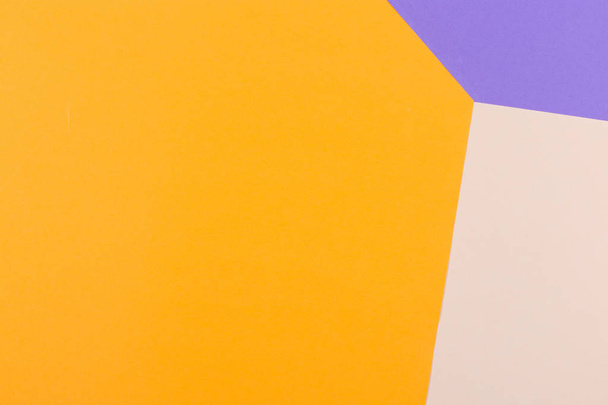 Paper empty purple, yellow, pastel background, geometrically located. Color blank for presentations, copy space. - Zdjęcie, obraz