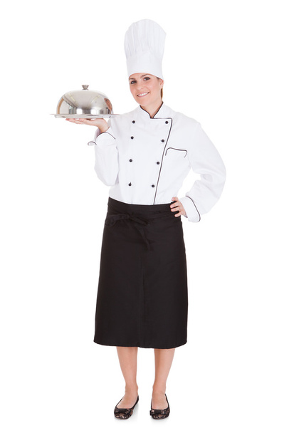 Portrait Of Female Chef Holding Tray - Foto, Imagem
