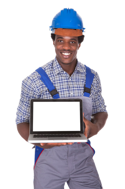 Male Craftsman Holding Laptop - Valokuva, kuva