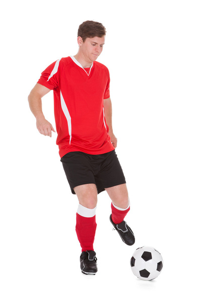 Soccer Player Kicking Ball - Фото, изображение
