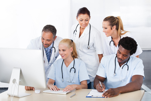 Group Of Doctors Working Together - 写真・画像