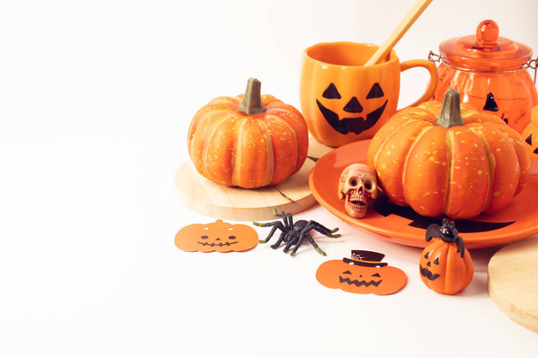 holiday season in halloween pumpkin dish food with decoration prop toy fun on white background - Photo, image