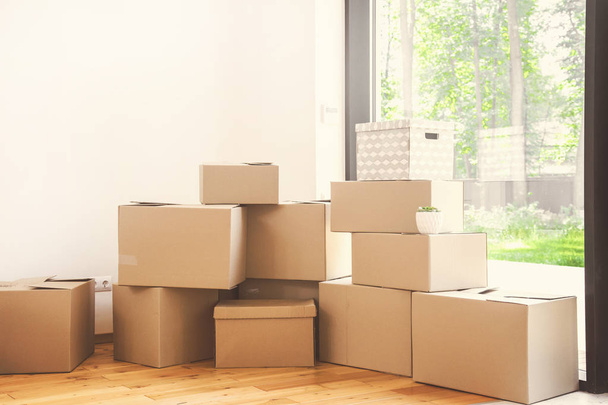 Moving day, cardboard boxes in new apartment - Φωτογραφία, εικόνα