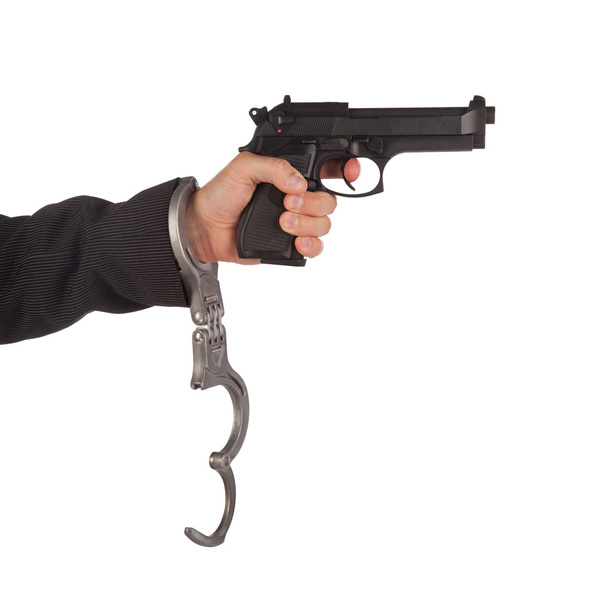 biznesmen z pistoletem i kajdanki - Zdjęcie, obraz