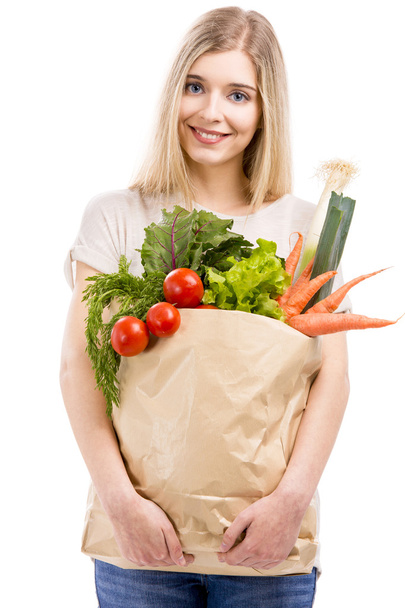 Kaunis nainen kuljettaa vihanneksia
 - Valokuva, kuva