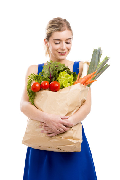 Bella donna che trasporta verdure
 - Foto, immagini