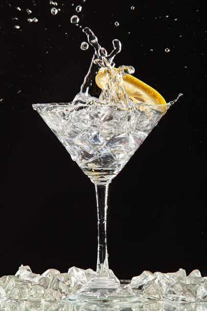 Glass, Lemon And Splash Of Water - Fotó, kép