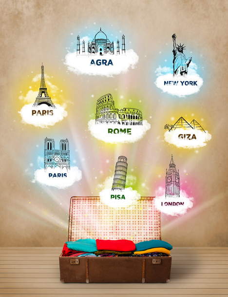 Tourist suitcase with famous landmarks around the world - Photo, Image