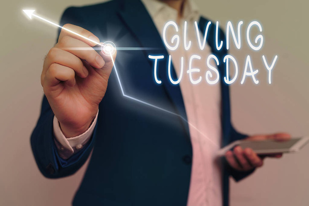 Escritura a mano conceptual mostrando Giving Tuesday. Foto de negocios mostrando el día internacional de la caridad dando activismo Hashtag
. - Foto, imagen