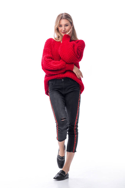 happy young woman in red sweater. isolated on white - Fotografie, Obrázek