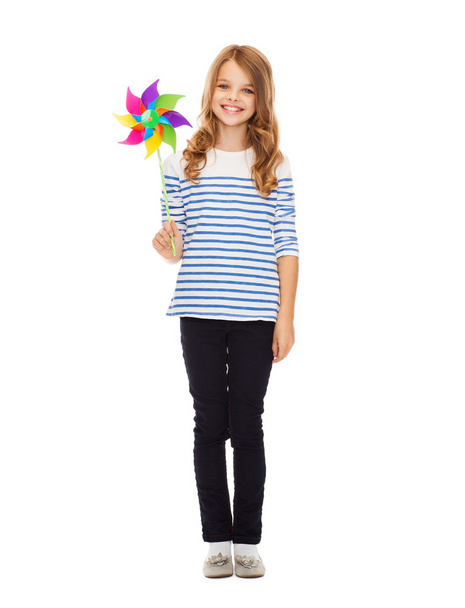 Child with colorful windmill toy - Фото, изображение
