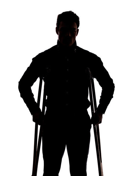 Man with broken leg - Foto, afbeelding