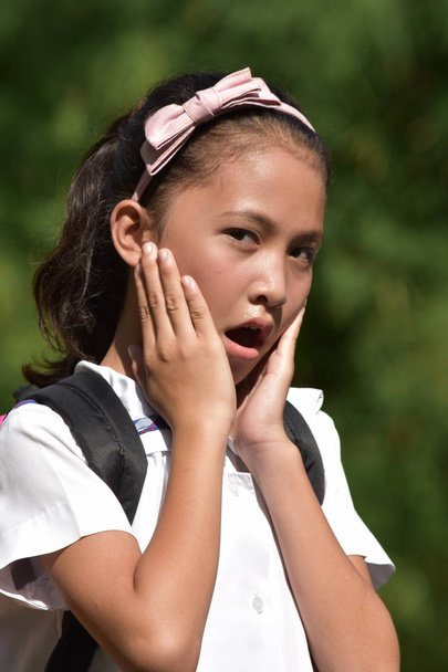 Shocked Young Filipina Girl Student Wearing Uniform - Foto, afbeelding