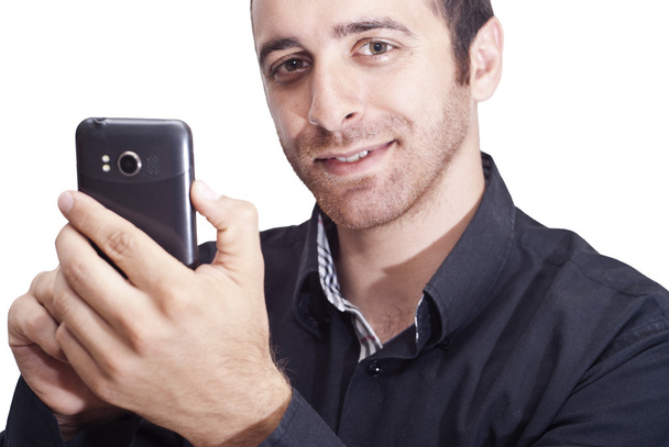 handsome businessman with a smartphone - Photo, Image