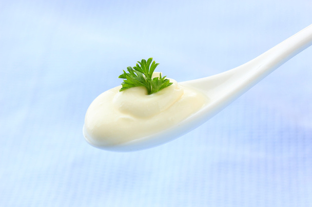Sour cream in spoon close-up - Fotó, kép