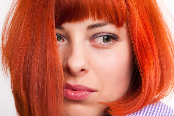Beauttiful woman with red hair - Фото, изображение