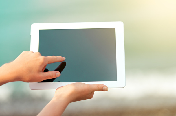 white tablet with a blank screen in the hands - Photo, Image