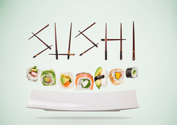 Pieces of delicious japanese sushi frozen in the air. - Φωτογραφία, εικόνα