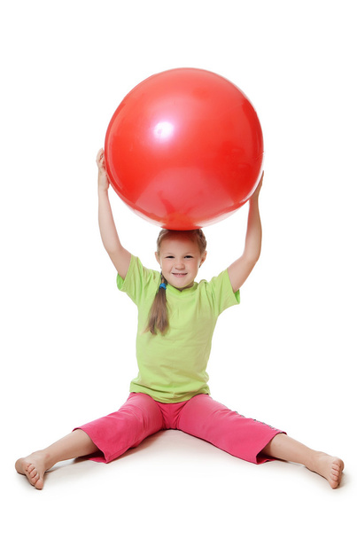 Little girl with a gymnastic ball - Fotó, kép