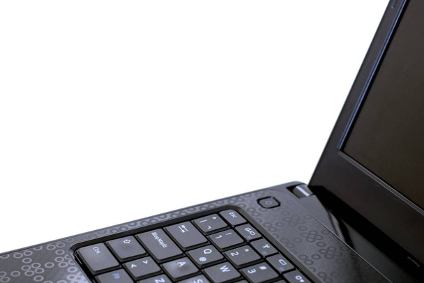 Черная клавиатура ноутбука крупным планом. Концепция мобильных, портативных устройств
. - Фото, изображение