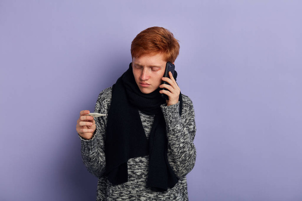 young unhappy sad man making a phone call. Cold and Sickness - Photo, image