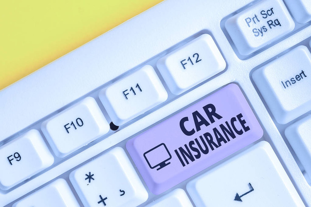 Writing note showing Car Insurance. Business photo showcasing Accidents coverage Comprehensive Policy Motor Vehicle Guaranty White pc keyboard with note paper above the white background. - Photo, Image