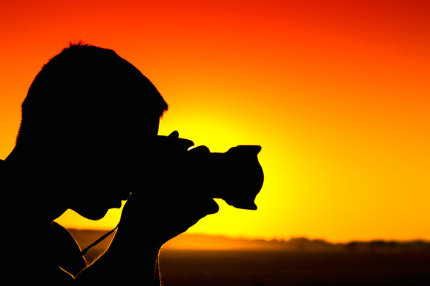 Silhouette of photographer - Foto, Bild
