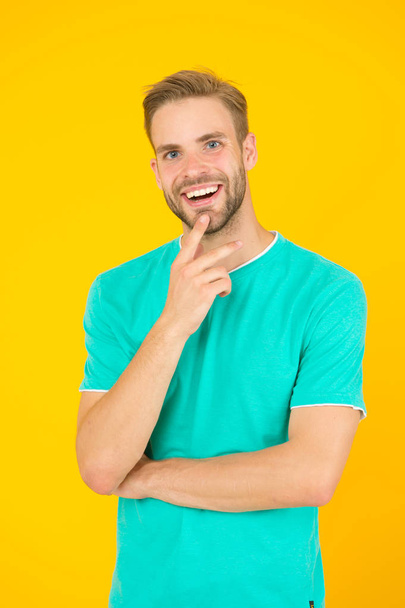 Idea. Male beauty. Barber hairdresser salon. Handsome bearded man. Something on his mind. Handsome man thinking yellow background. Well groomed handsome guy with bristle and stylish hairstyle - Fotó, kép