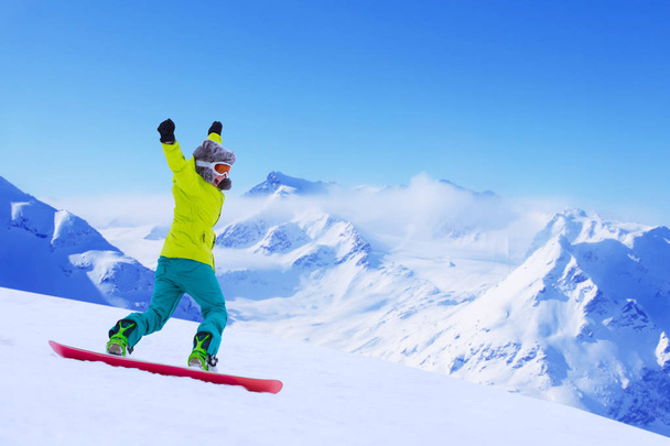 Snowboarder running down slope - Photo, Image