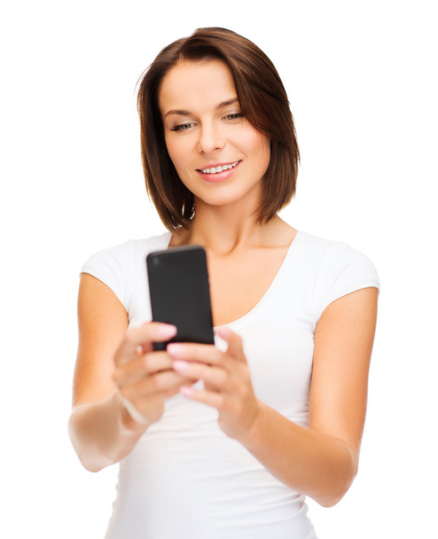 Woman browsing in smartphone - Фото, изображение