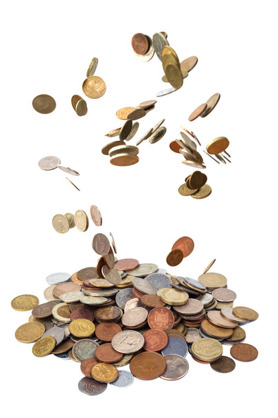 Монети падають на білу поверхню
 - Фото, зображення