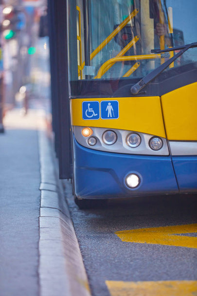 Public transportation / bus in urban surroundings on the street. - Foto, Imagen