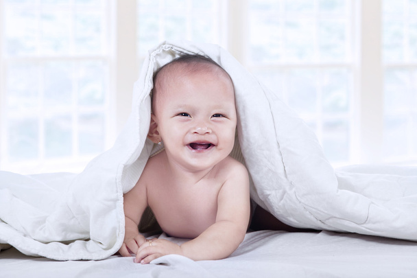 Sad baby boy under blanket at home - Valokuva, kuva