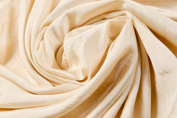 Fondo suave de tela de seda beige liso. Textura de tela.  - Foto, imagen
