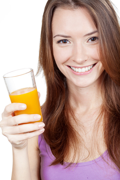 Beautiful brunette woman holding glass of juice - Fotografie, Obrázek