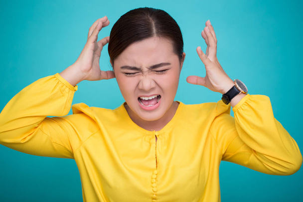 Angry woman screaming out and pulling her hair - Photo, Image
