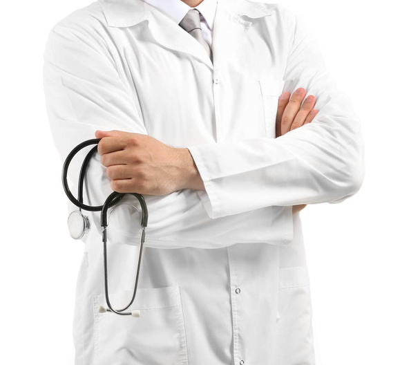 Male doctor with stethoscope on white background - Foto, Bild