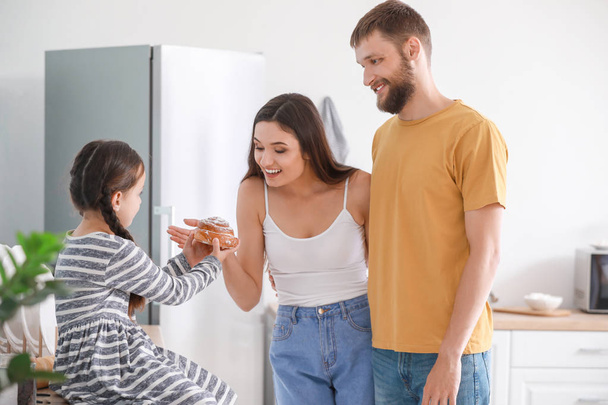 Young family together in kitchen - Photo, Image