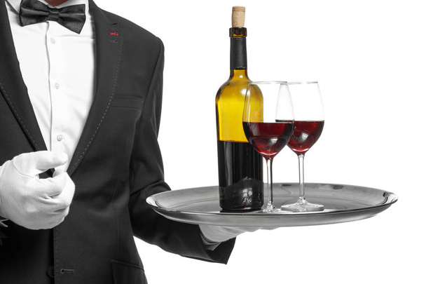 Handsome waiter with wine on white background, closeup - Photo, Image