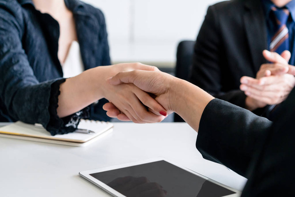 Business people handshake agreement in office. - Photo, Image