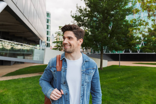 Handsome young man dressed casually spending time outdoors - Photo, Image