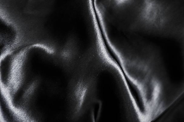 Lüks siyah yumuşak ipek yatık arka plan doku, tatil glamo - Fotoğraf, Görsel