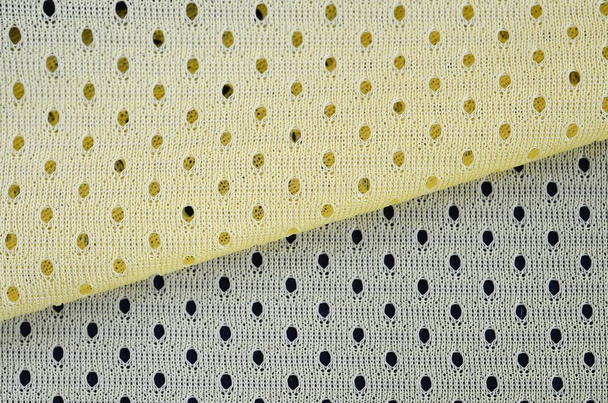 Κίτρινο πλέγμα Αθλητισμός φθορά ύφασμα υφάσματος μοτίβο - Φωτογραφία, εικόνα