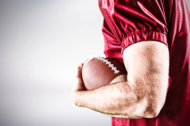 American Football Player isolated on grey background  - Foto, Imagem