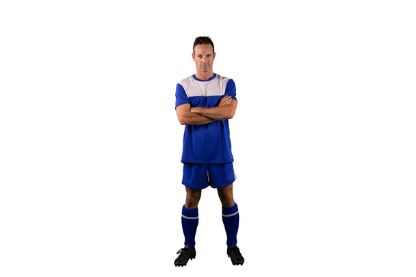 Focused Soccer Player isolated on white background - Foto, imagen