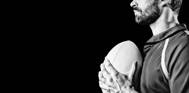 Tough Rugby Player isolated on black background - Fotoğraf, Görsel