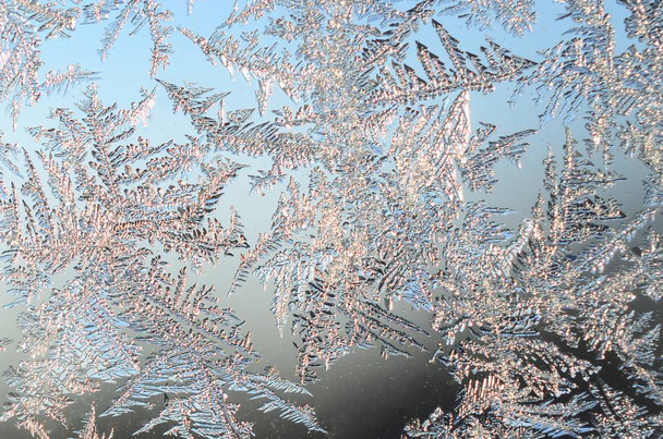 Snowflakes frost rime macro on window glass pane - Photo, Image