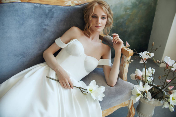 Luxurious white wedding dress on the girl's body. New collection - Fotografie, Obrázek