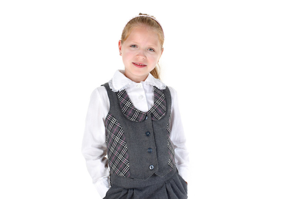 8 year old school girl smiling on white background - Zdjęcie, obraz