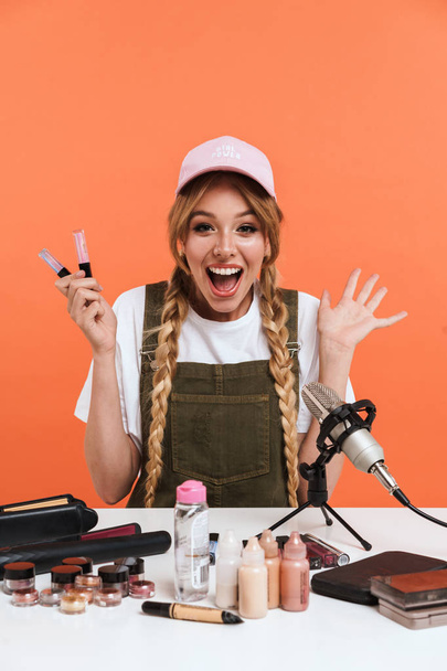 Image of excited girl recording blog broadcast with microphone a - Fotoğraf, Görsel